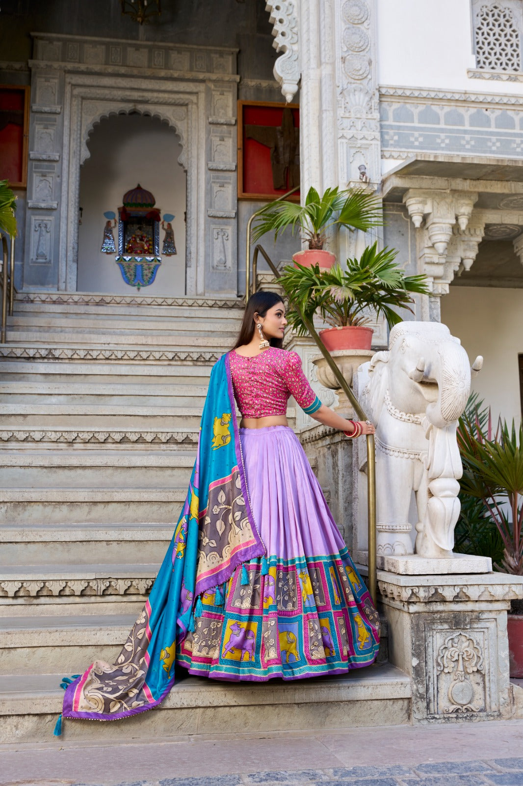 Lehenga Choli Draped In Tradition, Shining In Silk in purple color