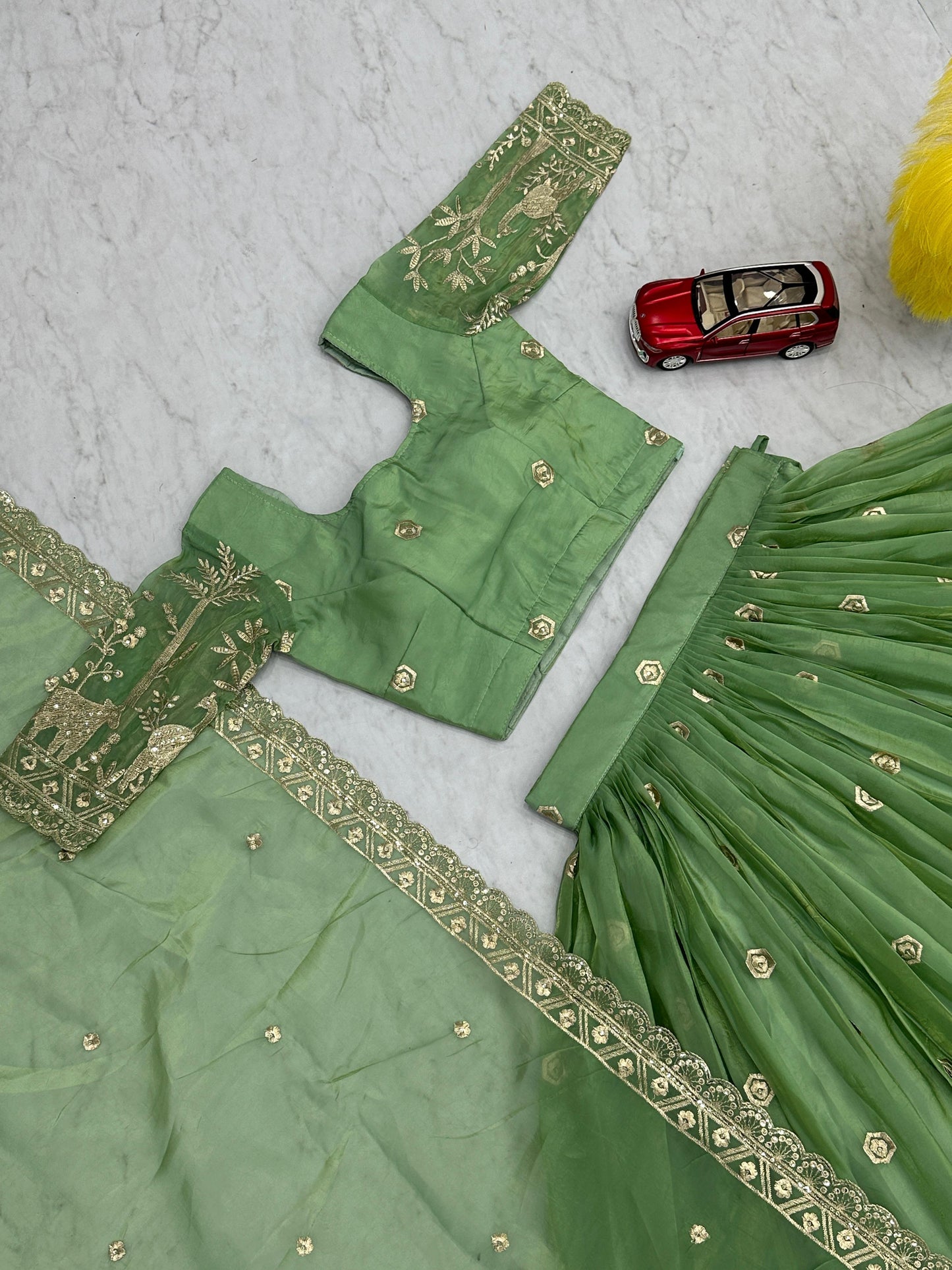 Festival Lehenga Choli in green color in crush fabric