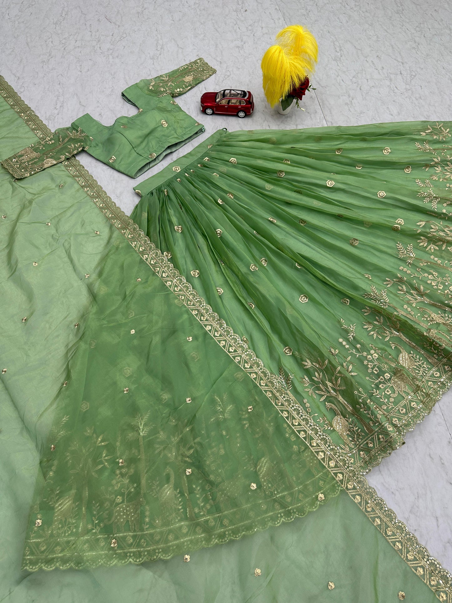Festival Lehenga Choli in green color in crush fabric