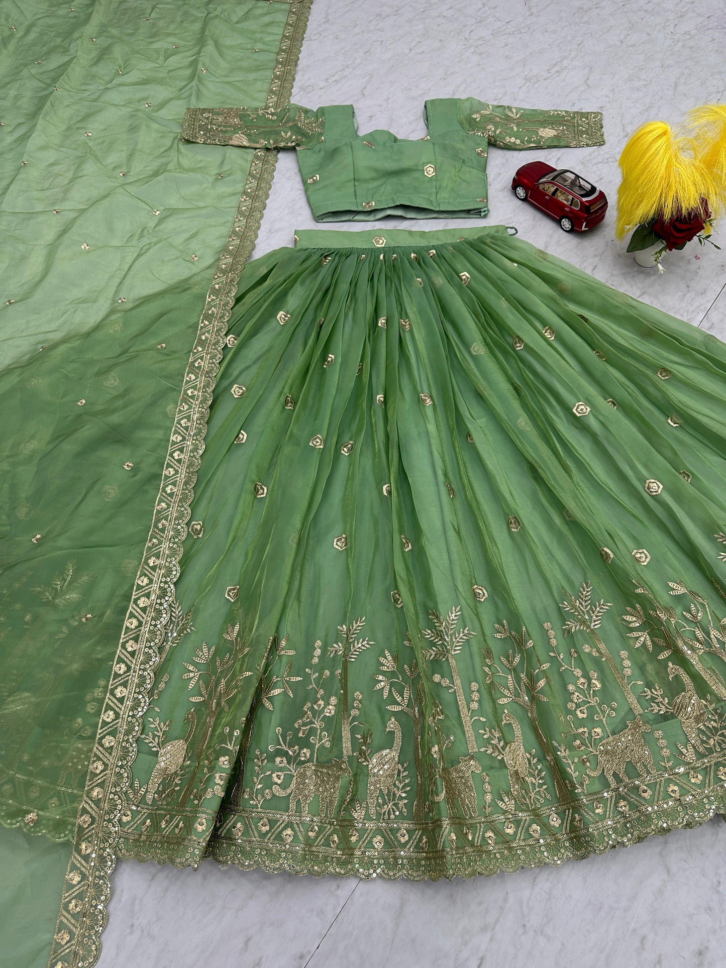 Festival Lehenga Choli in green color in crush fabric