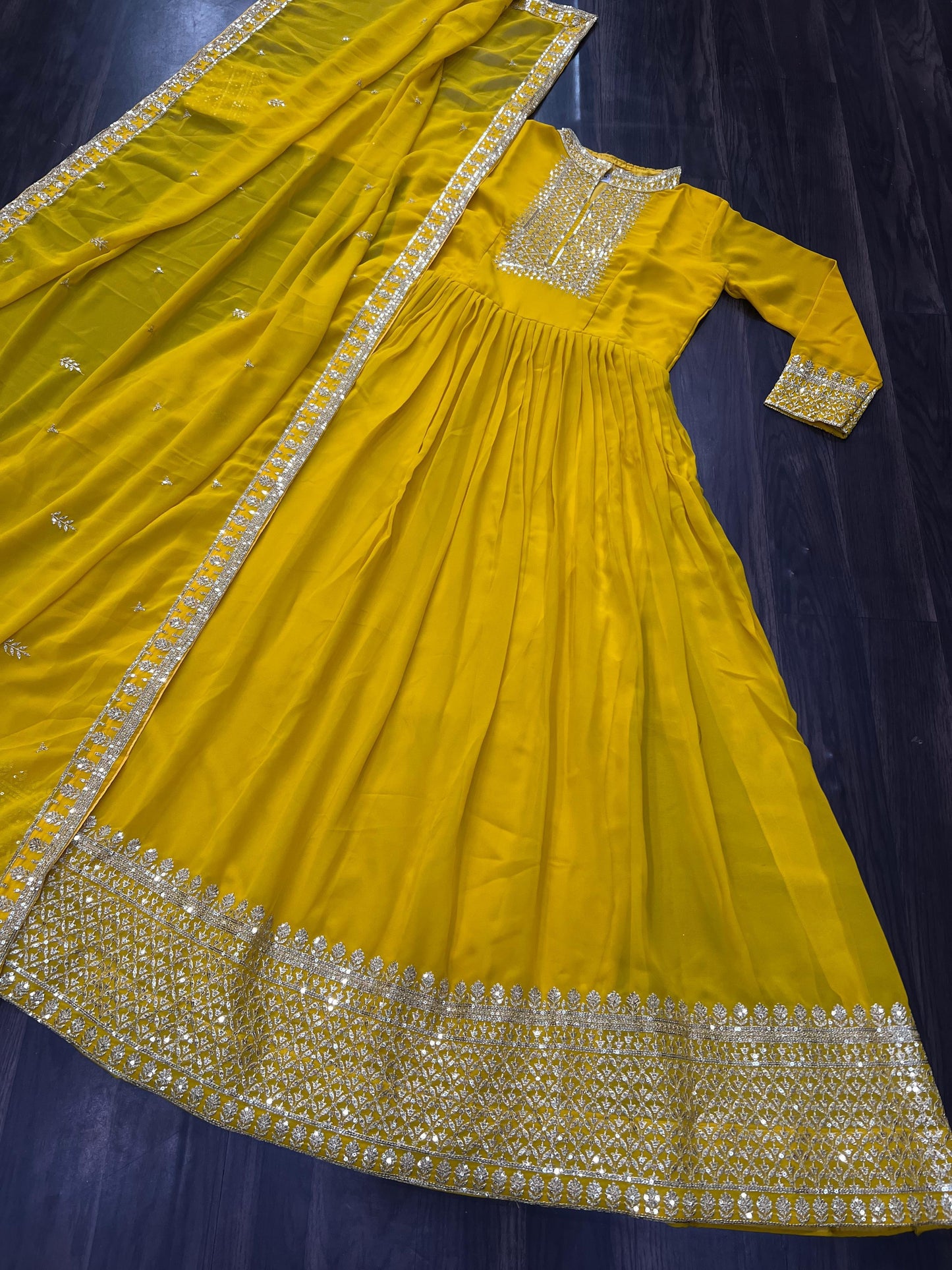 yellow Color Outfit Made From Georgette Fabric And Sequins Embroidered Work