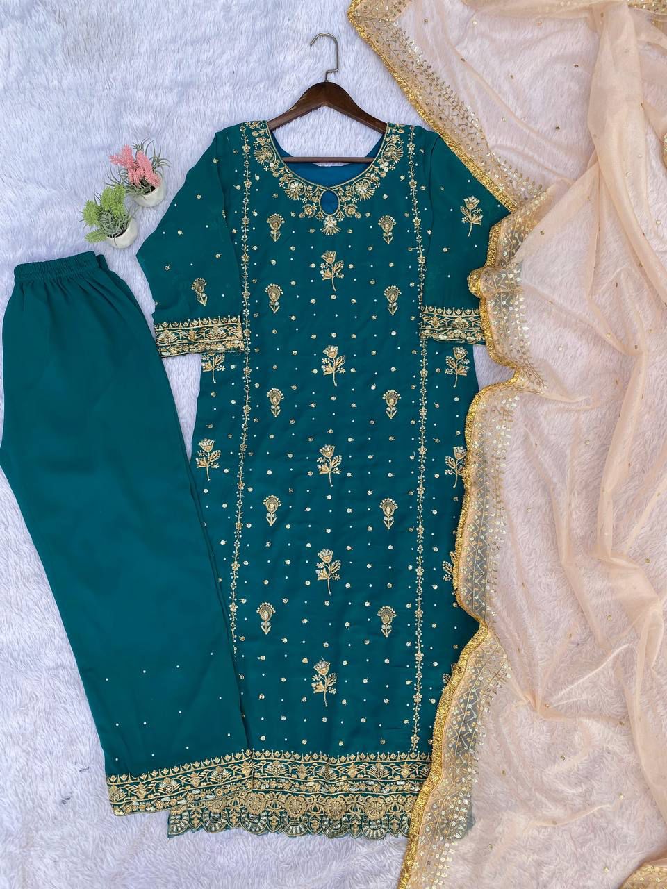 georgette with sequence embroidered and original motti handmade work top and pent with dupatta