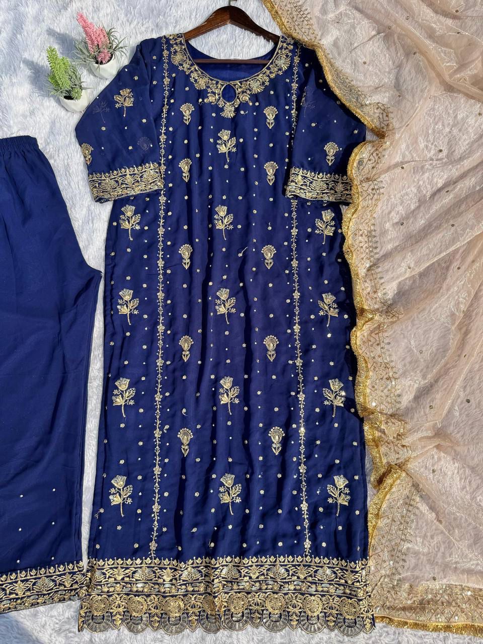georgette with sequence embroidered and original motti handmade work top and pent with dupatta