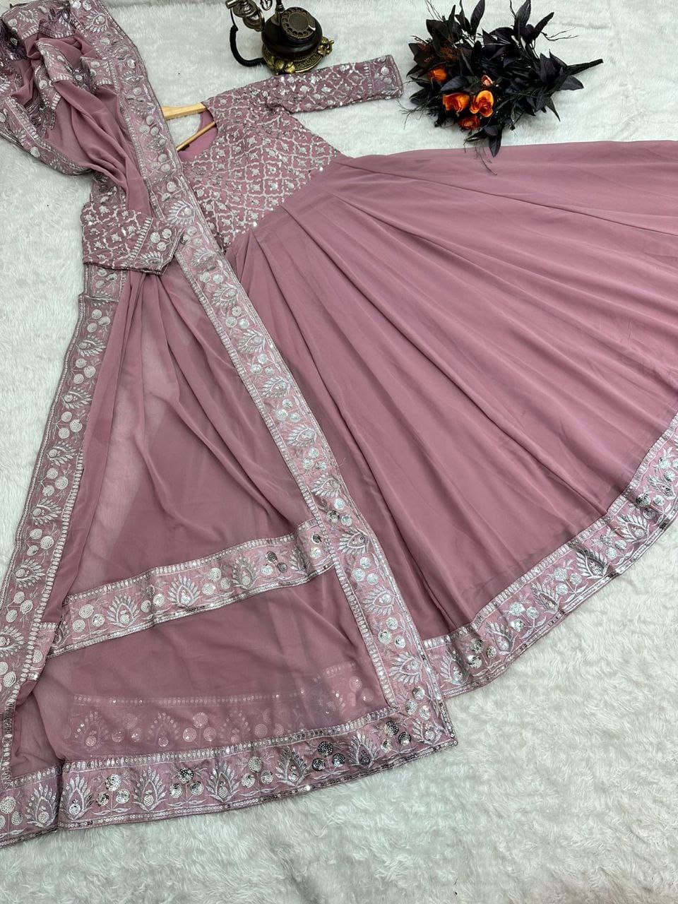 light pink color gown in georgete fabric