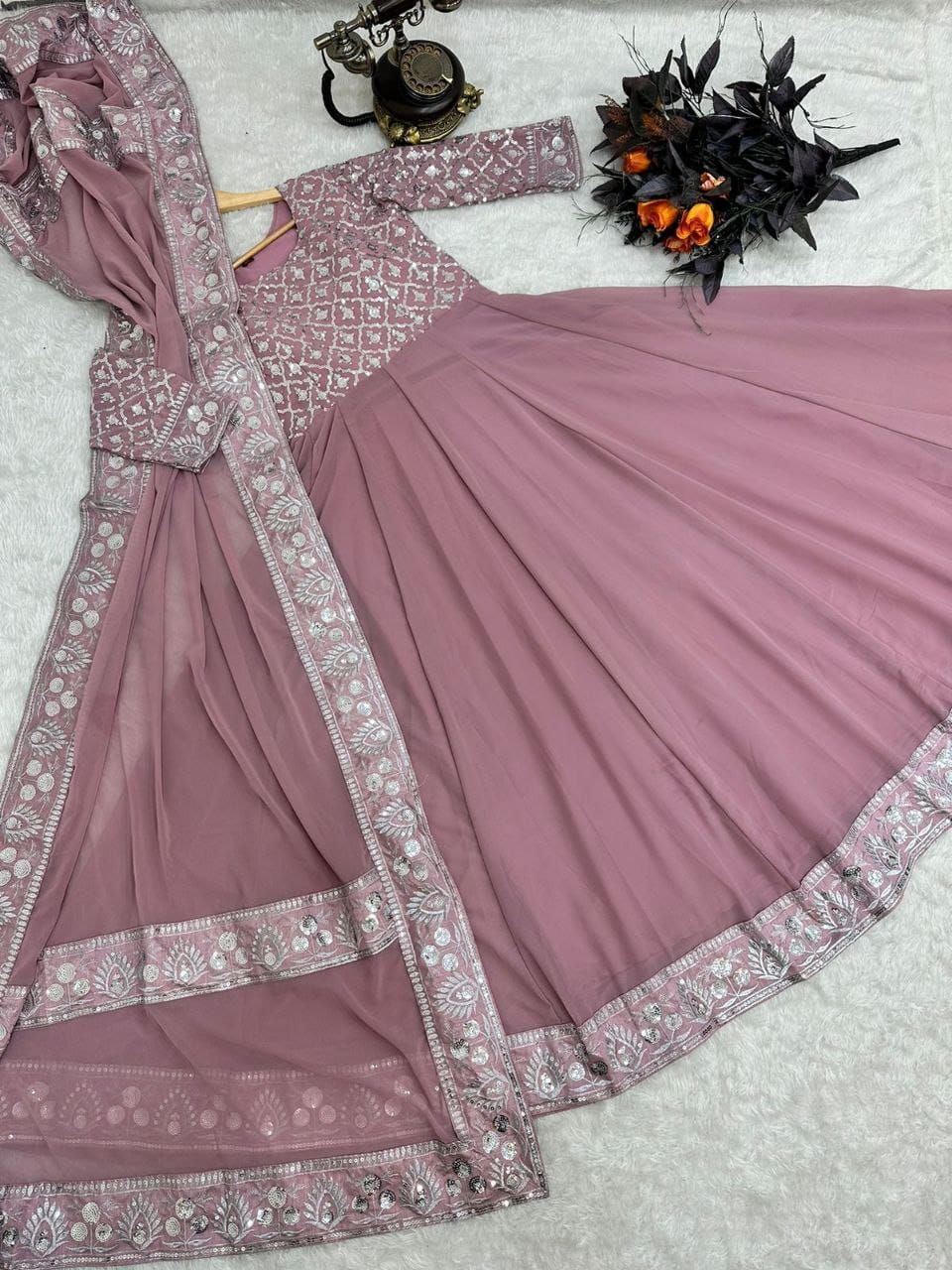 light pink color gown in georgete fabric