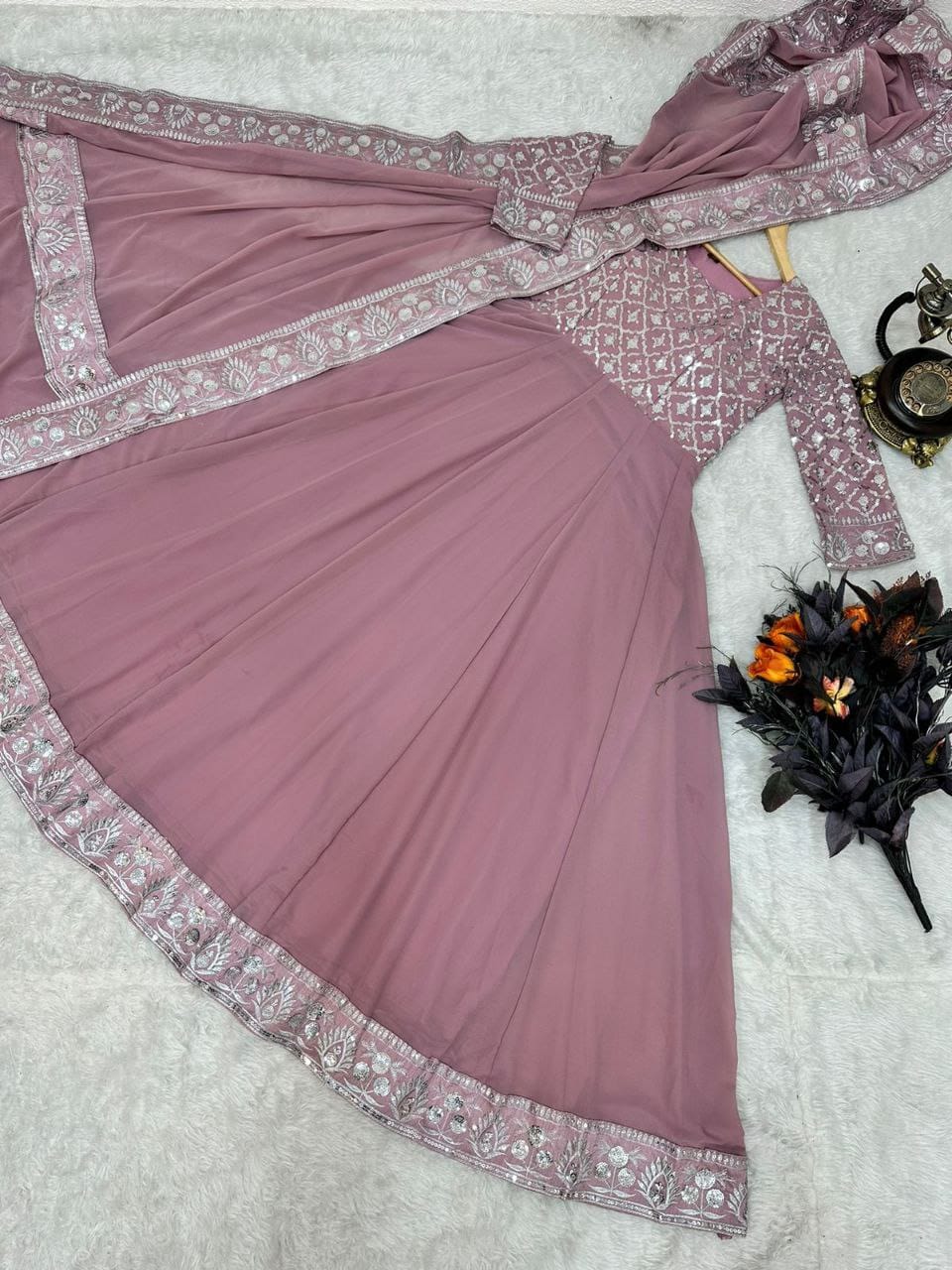 light pink color gown in georgete fabric