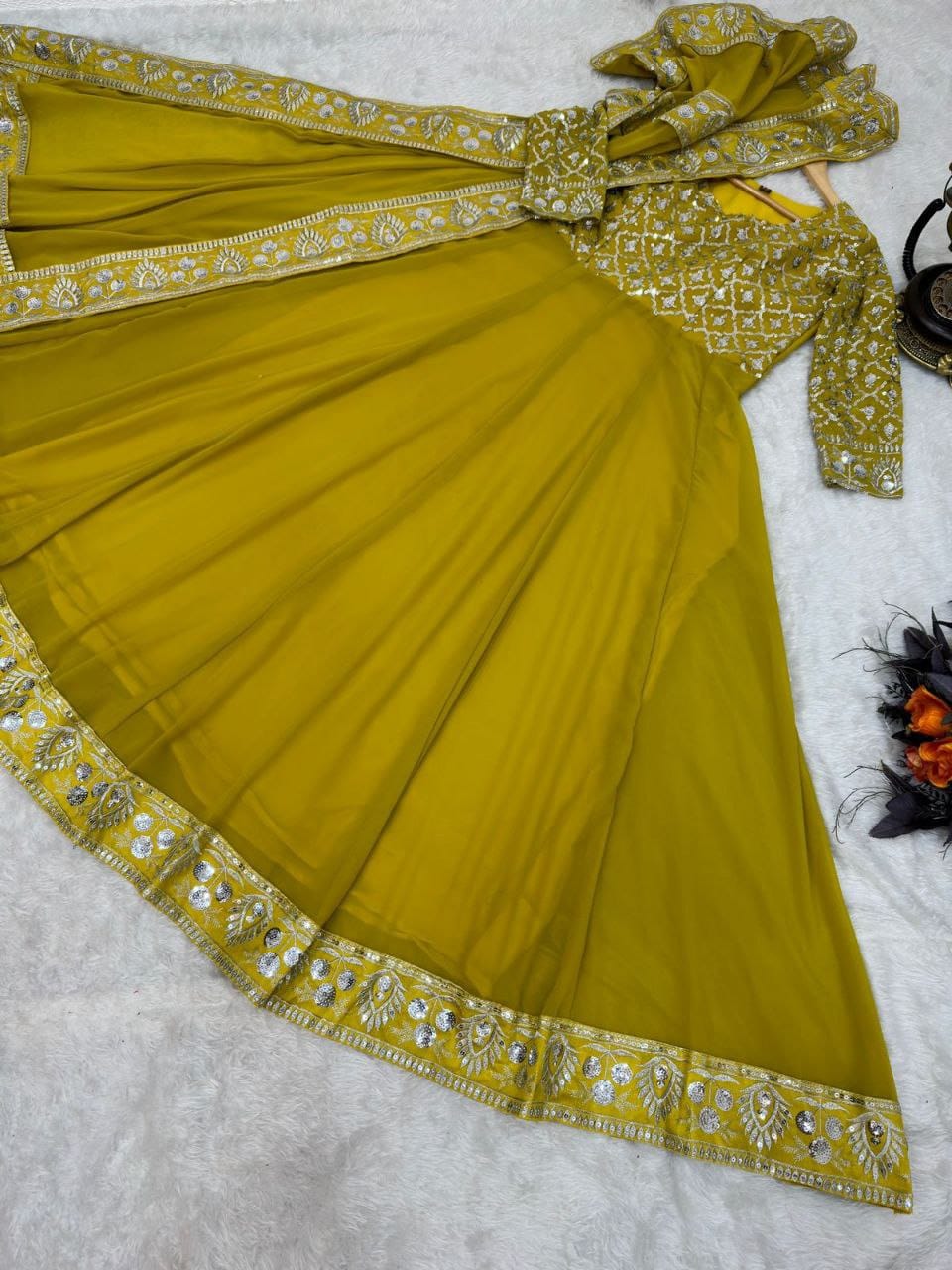 yellow color gown in georgete fabric