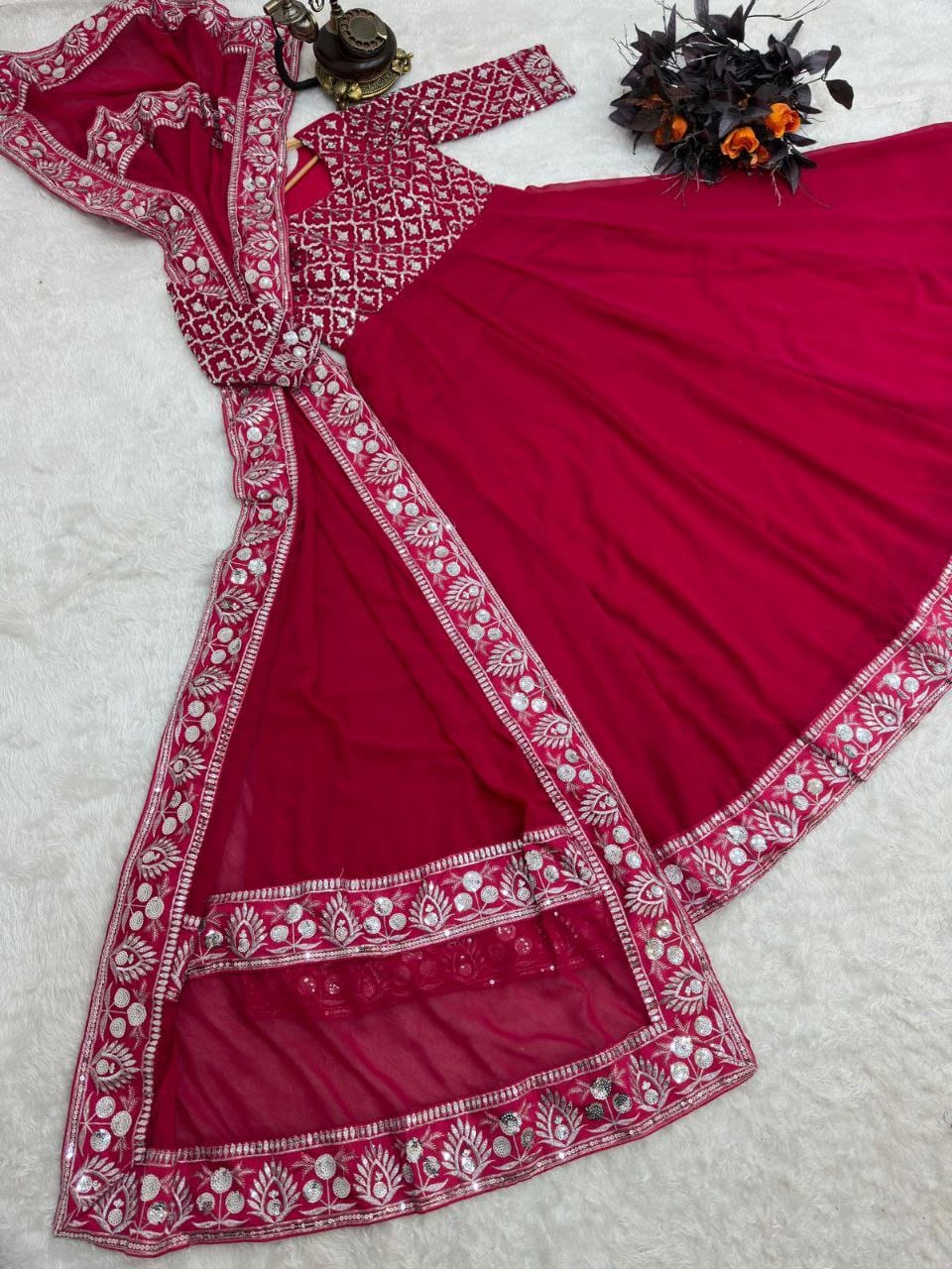 Red color gown in georgete fabric
