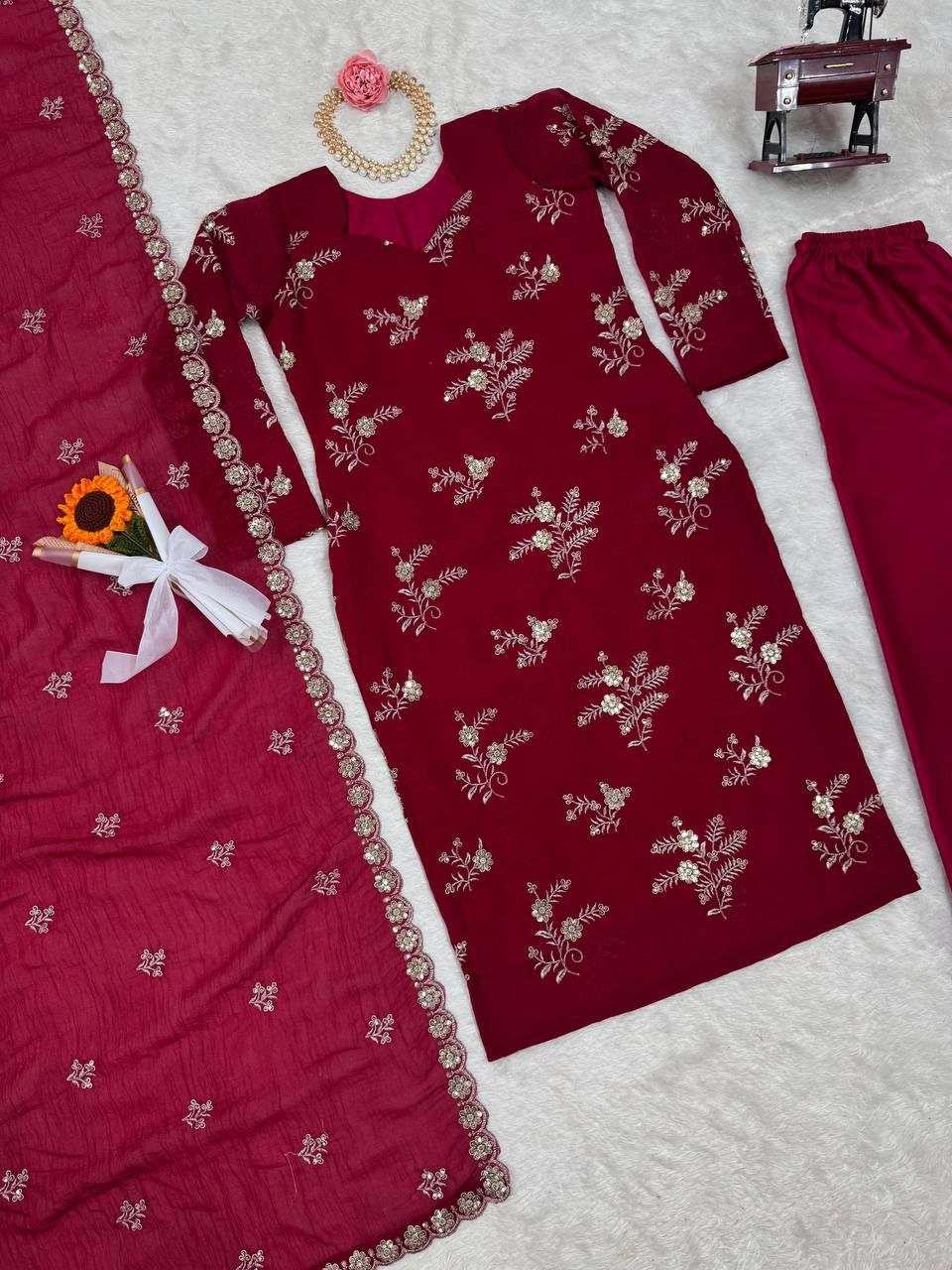 Red color partywear dress in silk fabric