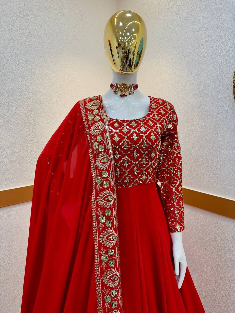 Red color gown in georgete fabric