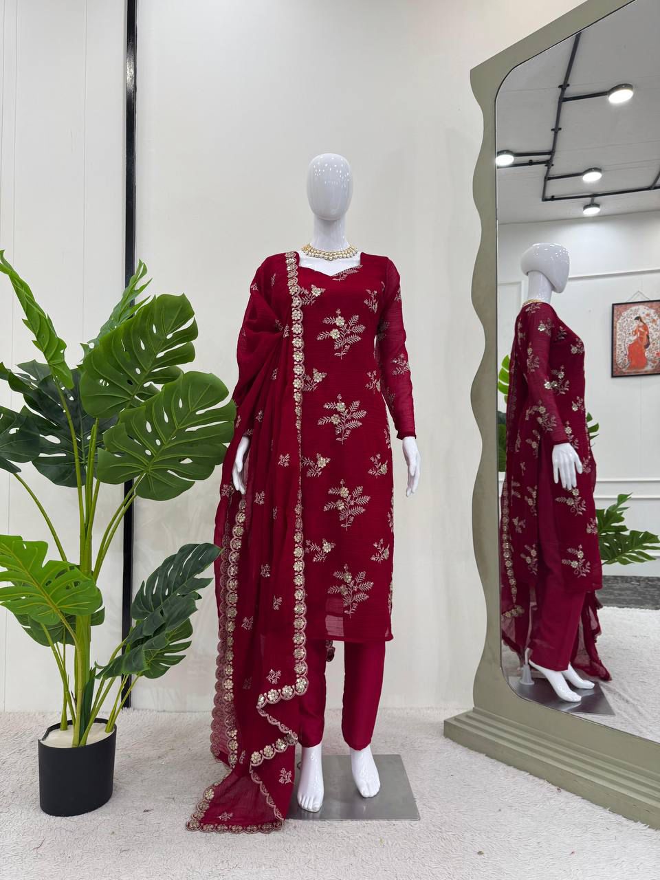Red color partywear dress in silk fabric