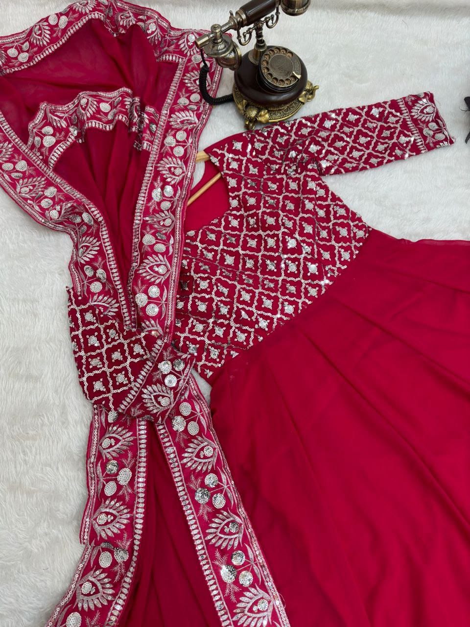 Red color gown in georgete fabric