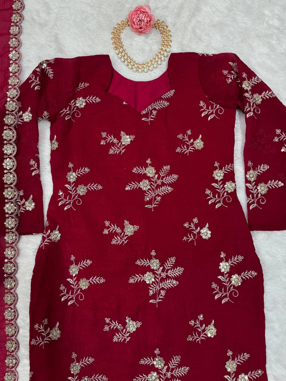 Red color partywear dress in silk fabric