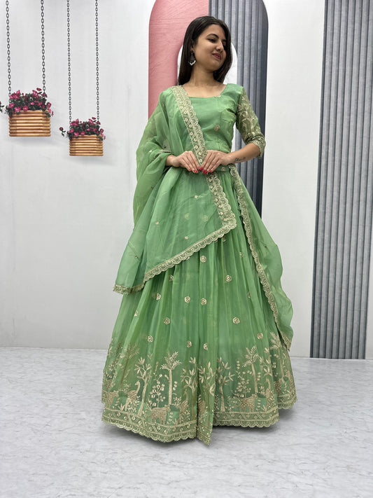 Festival Lehenga Choli in green color in crush fabric