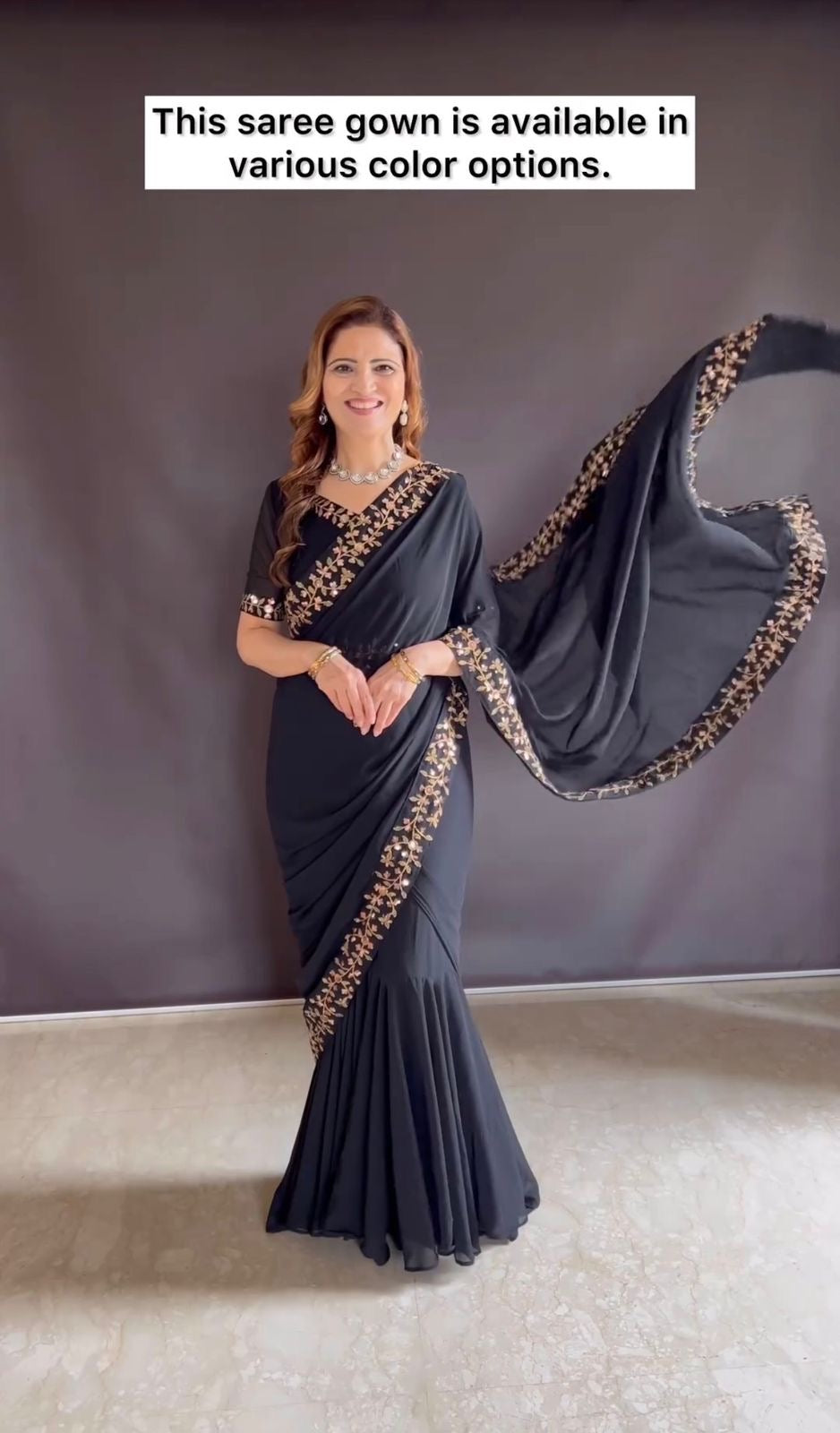 Trending Georgette Fabric With Embroidery Work Border Full Flair Stitched Saree-Gown in black color