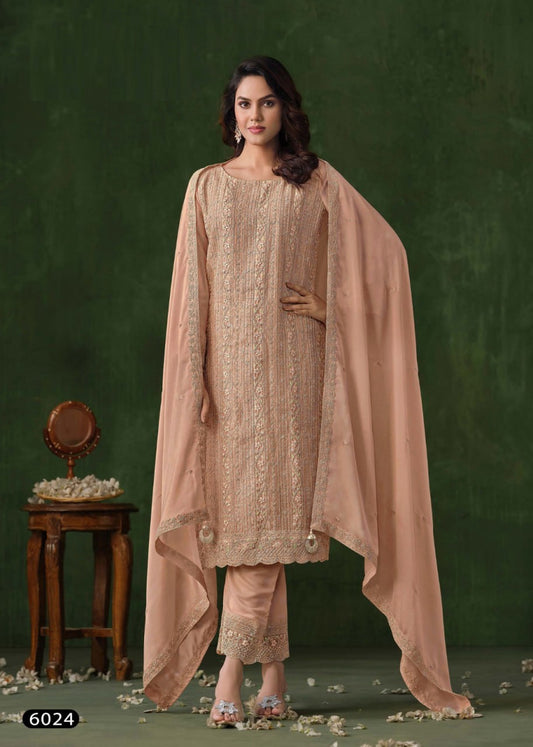 Beautiful Partywear Heavy Unstitched Rangoli Silk Suit in peach color