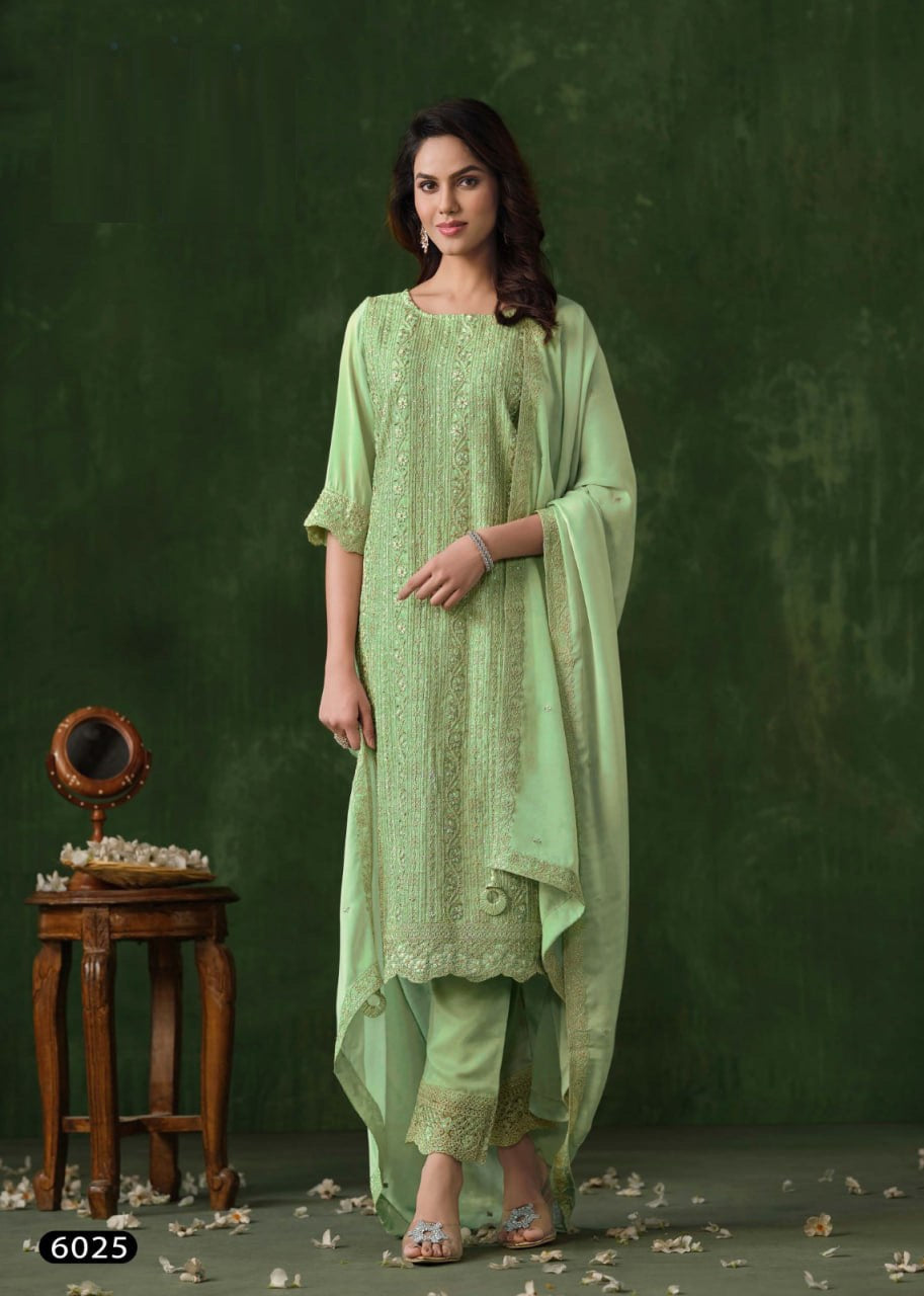 Beautiful Partywear Heavy Unstitched Rangoli Silk Suit in green color