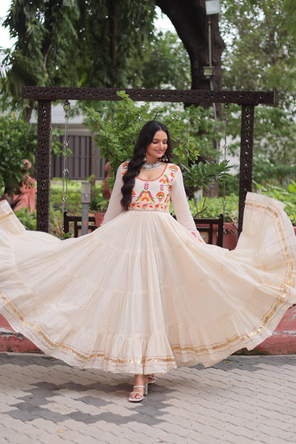 Off white color gown in cotton fabric with 10 + meter flair