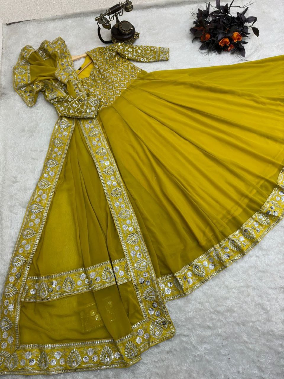 yellow color gown in georgete fabric