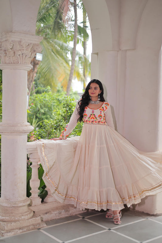 Off white color gown in cotton fabric with 10 + meter flair